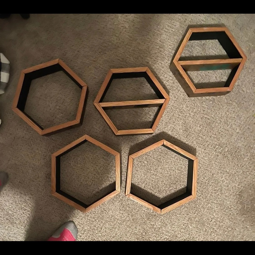 Hexagon shaped floating whiskey shelves